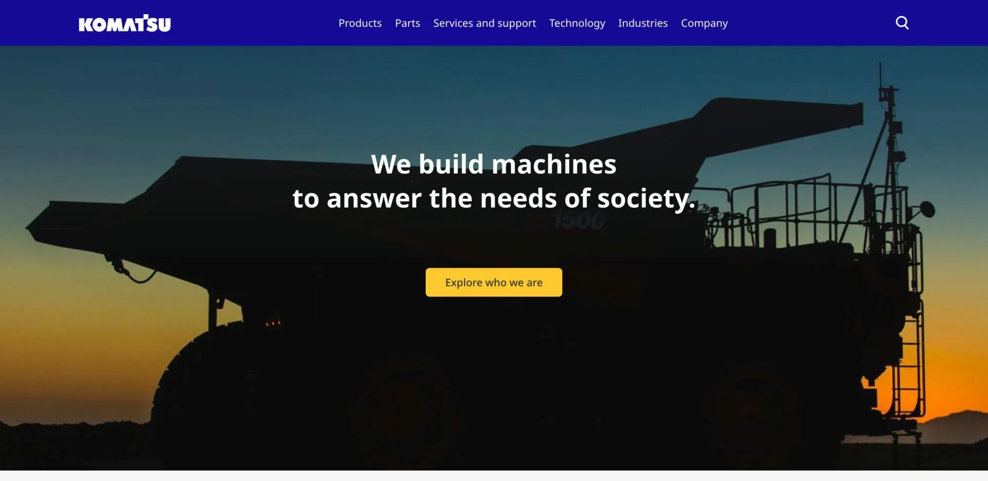 Komatsu homepage: silhouette of a giant mining haul truck at sunset with the headline “We build machines to answer the needs of society”